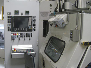CNC control cabinet of a wet blasting machine